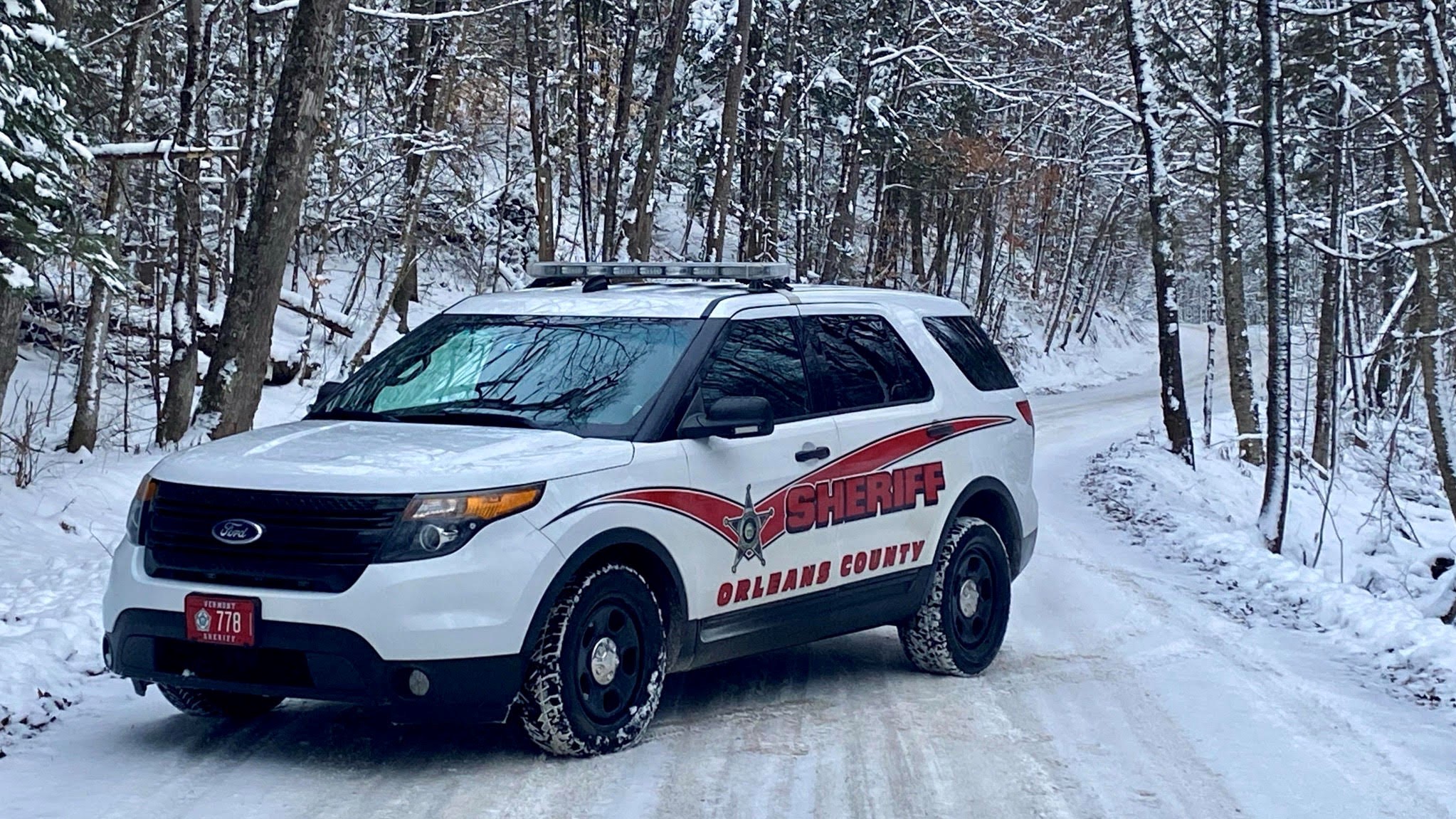 Winter picture of a cruiser on a snowy road